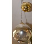 A large silvered witch ball and a smaller gold coloured ball. Condition Report: The diameter of