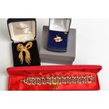 A Swarovski crystal and gold coloured metal bracelet, original box,