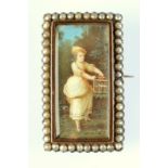 A rectangular pearl bordered brooch with a miniature showing an 18th century girl with a caged song