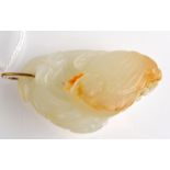 THE LESLIE DAVIE COLLECTION OF JADE

A white and russet jade pendant carved as a cockerel,