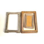 Three silver photograph frames, the largest 15.5 x 10.5cm.