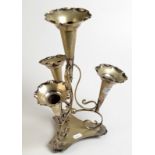 A plated four nozzle epergne.