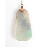 A jade gold mounted pendent.