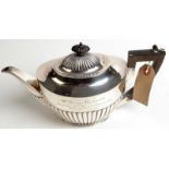 A half fluted Edwardian oval section teapot, 16ozs.