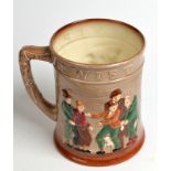 A Royal Doulton Oliver Twist large moulded mug.  Height 15cm.