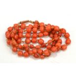A coral bead necklace with gold clasp. Condition Report: Weight 11.6 gm.
