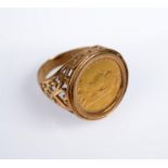 A Victorian shield back half sovereign 1890, in 9ct. gold ring mount, 9.4g.