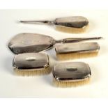 A Canadian silver backed four piece dressing table set, each stamped 'Birks Sterling',
