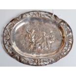 A late Victorian silver import dish embossed with classical figures and with a band of pierced