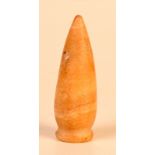An ancient alabaster alabastron with pointed base, length 5cm, probably Greek.
