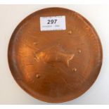 A Newlyn copper pin tray with a single fish amongst air bubbles and currents, diameter 13.