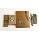 A cigarette case decorated with metal feathers and paste stone,