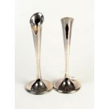 A pair of modern silver candlestick holders in the form of calla lilies, by Braybrook & Britten,