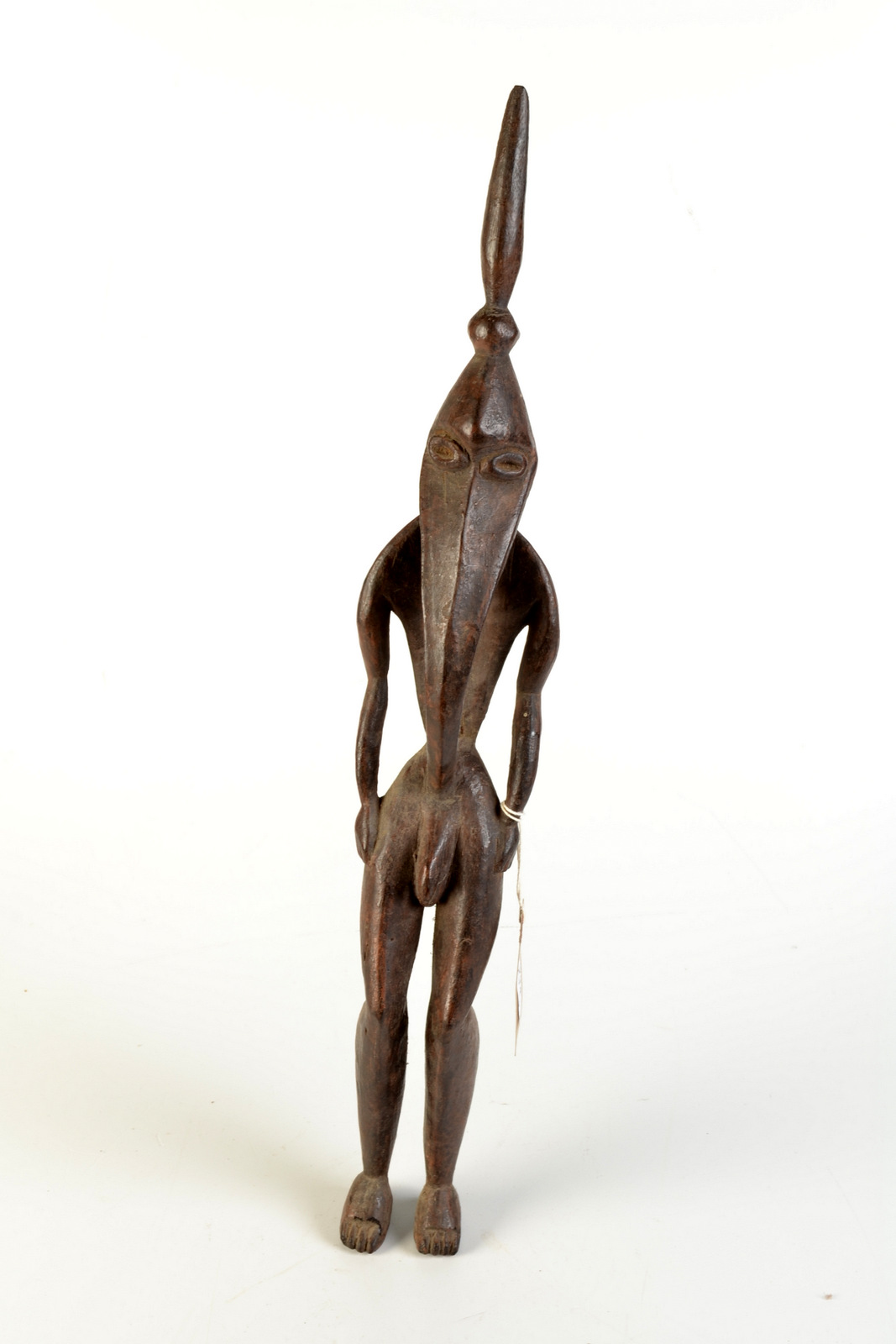 THE SHEILA ROSENBERG COLLECTION

A Papua New Guinea male bird head figure, height 58cm.