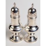 A pair of Birks Sterling baluster silver peppers, 100gms, height 12.5cm.