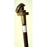 COLLECTION OF UNUSUAL WALKING CANES

A Swiss Brevete walking cane, the handle with a circular