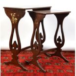 Two Chinese lacquered, nesting tables.