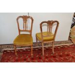 A set of four of high Victorian inlaid bedroom chairs.