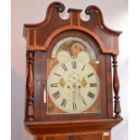 A north country 19th century eight day long case clock, with revolving lunar arch, and painted dial,