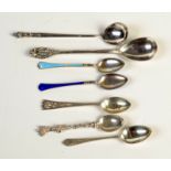 A COLLECTION OF RUSSIAN SILVER

A Russian silver spoon with naturalistic bear finial,