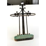 A wrought iron stick stand in the manner of Voysey. Condition Report: The full height from the floor