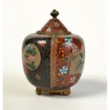 A Japanese cloisonne lidded jar, 10cm.