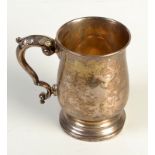 A Georgian style silver mug with acanthus capped handle, Sheffield, 1947, 9.3oz.