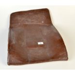 A pilots brown rexine contoured back pad.