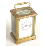 A French brass Corniche cased carriage clock with cylinder escapement. Height 10.5cm.