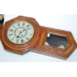 An American drop case wall clock with octagonal hood.