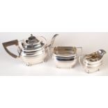 A three piece tea service.