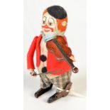 A Schuco tinplate clockwork clown violinist.