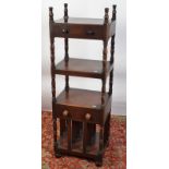 An unusual George IV mahogany whatnot Canterbury with ring turned supports and four tiers