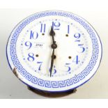 An enamelled continental wall clock.