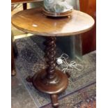 An occasional table, the base being a Victorian pole screen stand.