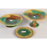Majolica plates and stands.