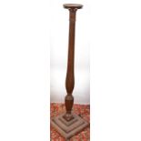 A torchiere made from an 18th century bed post.