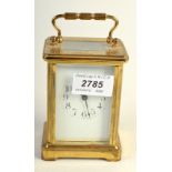 A French Queen Mary presentation brass carriage clock with crowned M dated Feb 28 1922.