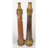 Two vintage brass and copper hose nozzles, each length approximately 46cm.