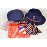 Two British Airways cabin staff hats, together with a related tie, belt etc.