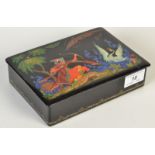 A Russian lacquer box painted with a scene from the fairy tale `The Swan Princess`, signed Tianex