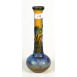 An overlay vase in Galle style, etched with a pond design through blue olive and amber glass, signed
