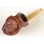 A Bruyere Veritable tobacco pipe carved as the head of a Turk.