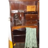 A narrow Regency style bookcase with a single open shelf above a curtained, adjustable shelf.