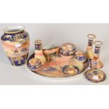 A Noritake, dessert scene decorated dressing table set and a matching vase.