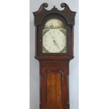 A longcase clock, the thirty hour movement having arched painted dial depicting a coastal