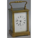 A French carriage clock, of oblong form having white enamelled dial with Roman numerals inscribed "