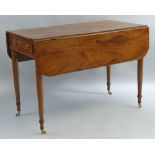 A mahogany pembroke table, having D shaped leaves over two end drawers with brass ring handles on