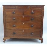 A Victorian mahogany chest, with satinwood inlay, the reeded edged top over three frieze drawers,