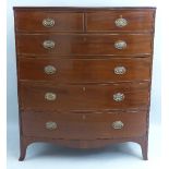 A 19th Century mahogany bow front chest, the reeded edged top over two short and four long graduated